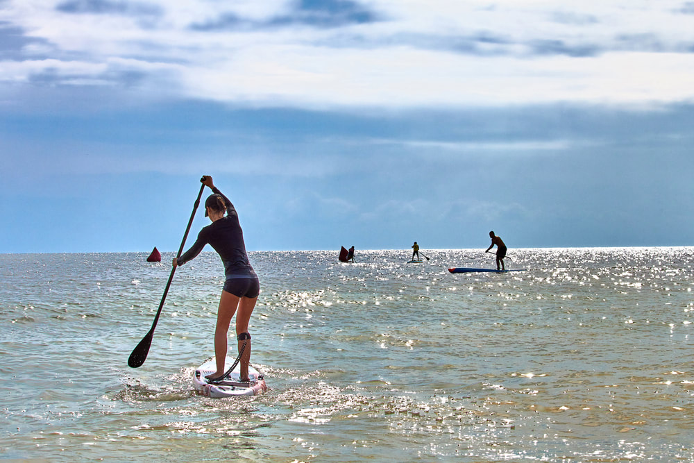fit_woman_on_Paddle_board